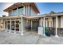 Mid-century modern home with striped facade and private entrance at 3847 S Eastern Ave, Las Vegas, NV 89169