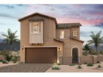 Two-story home with stone accents and a two-car garage at 8993 Faxom St, Las Vegas, NV 89166