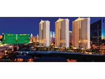 Luxury high-rise building with city views at night at 125 E Harmon Ave # 1702, Las Vegas, NV 89109