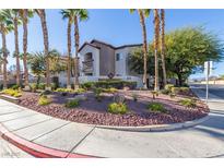 Attractive building exterior with landscaping and palm trees at 2615 W Gary Ave # 1035, Las Vegas, NV 89123