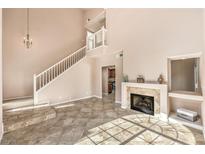 Spacious living room with fireplace and high ceilings at 337 Seine Way # 0, Henderson, NV 89014