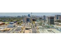 Aerial view of the city skyline, showcasing the building's location and surrounding cityscape at 150 N Las Vegas Blvd # 1505, Las Vegas, NV 89101