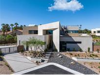 Modern luxury home with clean lines and desert landscaping at 3530 Cosima Ln, Las Vegas, NV 89120