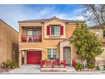 Two-story house with red accents and a red door at 9224 Nerone Ave, Las Vegas, NV 89148