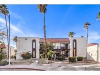 Attractive exterior of a two-story building with palm trees and landscaping at 1405 Vegas Valley Dr # 392, Las Vegas, NV 89169