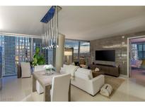 Spacious living room with city views and modern furniture at 3722 Las Vegas Blvd # 1712, Las Vegas, NV 89158