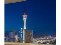 Night view of the city skyline with the Stratosphere and the Sahara Hotel lit up at 2777 Paradise Rd # 1105, Las Vegas, NV 89109