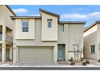 Two-story modern home with attached garage and landscaping at 6867 Evening Orchid St, North Las Vegas, NV 89086