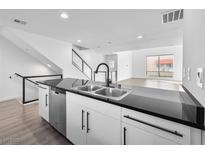 Modern kitchen featuring sleek countertops, stainless steel appliances and an open concept design at 250 Tower St, Las Vegas, NV 89101
