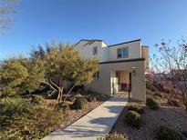 Charming two-story home with desert landscaping and a welcoming walkway at 3558 Herodain Ave, Las Vegas, NV 89106