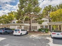 Condo building with covered parking and landscaping at 3055 Key Largo Dr # 203, Las Vegas, NV 89120