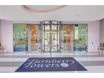 Elegant lobby entrance with a revolving door and 'Turnberry Towers' floor mat at 222 Karen Ave # 1005, Las Vegas, NV 89109