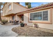 Inviting patio with seating area, perfect for outdoor relaxation at 1608 N Torrey Pines Dr # 104, Las Vegas, NV 89108