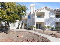 Attractive condo building with landscaping and walkway at 636 Yacht Harbor Dr # 203, Las Vegas, NV 89145