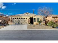 Charming single story home with a two car garage and desert landscaping at 7992 Barntucket Ave, Las Vegas, NV 89147