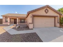 Charming single-story home with a well-maintained front yard and attached two-car garage at 286 Fairmeadow St, Henderson, NV 89012
