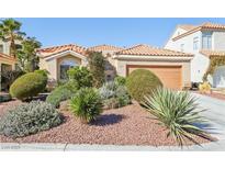 Charming single-story home featuring desert landscaping and a terracotta tile roof at 5517 Whiteleaf Ct, Las Vegas, NV 89149