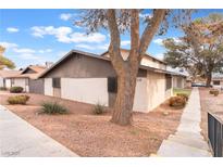 Charming single-story home with mature trees and well-maintained landscaping at 228 N Bruce St # D, Las Vegas, NV 89101