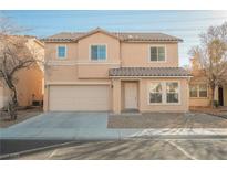 Charming two-story home with a tile roof, complemented by a two-car garage at 8216 Calico Wind St, Las Vegas, NV 89131