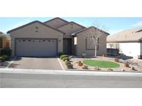 Charming single-story home with desert landscaping and a two-car garage at 2601 Centaurus St, Henderson, NV 89044