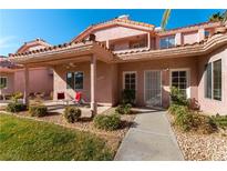 Charming home with landscaped front yard, covered porch, and tiled roof in a desirable location at 2810 Edmond St, Las Vegas, NV 89146