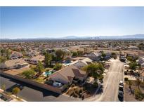 Expansive aerial view of a residential neighborhood, showcasing the home's location and neighborhood surroundings at 6557 Secluded Ave, Las Vegas, NV 89110