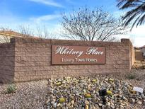 Beautiful entrance sign for Whitney Place Luxury Town Homes, set against a desert landscaped yard at 1463 Orange Jubilee Rd, Henderson, NV 89014