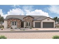 Charming single-story home featuring stone accents, a three-car garage, and desert landscaping at 5476 Middleton Falls Ave, Las Vegas, NV 89139