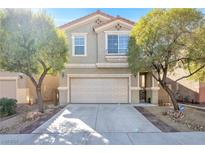 Charming two-story home with a well-manicured front yard and an attached two-car garage at 9171 Denver Sky Ave, Las Vegas, NV 89149