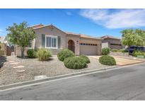 Charming single-story home boasts a well-manicured yard and a two-car garage at 2756 Strathblane Ave, Henderson, NV 89044