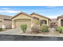 Charming single-story home with a two-car garage and low-maintenance desert landscaping at 6144 Corbin Ave, Las Vegas, NV 89122