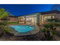 Inviting backyard with private spa, covered patio, lush landscaping, and serene ambiance, perfect for relaxation and outdoor enjoyment at 2820 Thunder Bay Ave, Henderson, NV 89052