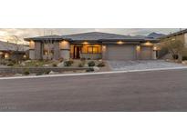 A stunning single story home with a three car garage and professional desert landscaping at 733 Aberdeen Tartan St, Las Vegas, NV 89138