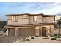 Two-story home featuring a neutral color palette, two-car garage, desert landscaping, and mountain views at 10256 Ansley Bay Ave, Las Vegas, NV 89166
