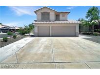 Charming two-story home featuring a two-car garage and well-maintained landscaping at 2180 Maple Shade St, Henderson, NV 89002
