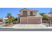 Charming two-story home featuring a two-car garage and well-maintained front yard at 2180 Maple Shade St, Henderson, NV 89002