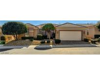 Charming single-story home with well-manicured landscaping and an attached two-car garage at 10505 Novella Ct, Las Vegas, NV 89135
