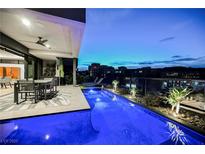 Inviting outdoor space featuring a modern pool and patio area, perfect for entertaining and relaxation at 38 Promenade Isle Ln, Henderson, NV 89011