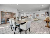 Bright and airy living room showcasing an open floor plan with modern furnishings and stylish decor at 351 Dandelion Brook Ct Ct, Las Vegas, NV 89148
