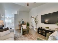 Bright living room featuring modern furnishings and stylish decor throughout at 8634 Lakota St, Las Vegas, NV 89123