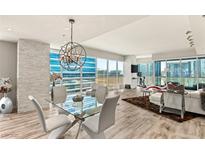 Bright and airy living room features floor to ceiling windows and an open floor plan at 4525 Dean Martin Dr # 2800, Las Vegas, NV 89103