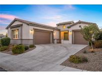 Beautiful single-story home featuring a well-manicured yard and two-car garage at 1 Vicolo Bella, Henderson, NV 89011