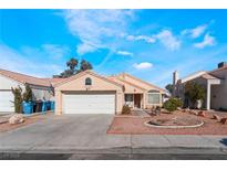 Charming single-story home with low maintenance desert landscaping and an attached two-car garage at 6224 Mandarin Dr, Las Vegas, NV 89108