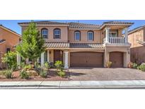Attractive two-story home featuring a well-manicured front yard and attached two-car garage at 6461 Mount Eden Ave, Las Vegas, NV 89139
