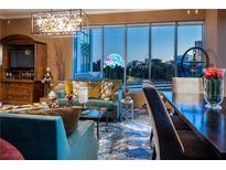 Comfortable living room area with great city views from the large windows at 360 E Desert Inn Rd # 407, Las Vegas, NV 89109