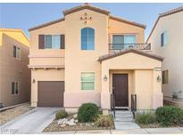 Charming two-story home with a well-maintained front yard and a cozy, inviting entrance at 9137 Entrancing Ave, Las Vegas, NV 89149