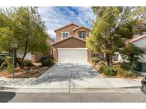 Charming two-story home with a well-manicured lawn, driveway, and a two-car garage in a residential neighborhood at 9529 Windsor Forest Ct, Las Vegas, NV 89123
