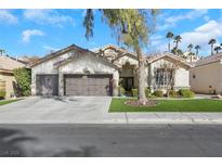 Charming single-story home features a well-manicured front yard and a spacious three-car garage at 1312 Rolling Sunset St, Henderson, NV 89052