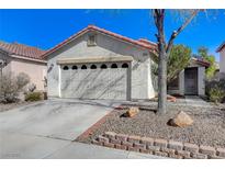 Charming single-story home with a two-car garage and low-maintenance landscaping in a desirable neighborhood at 7836 Lovely Pine Pl, Las Vegas, NV 89143