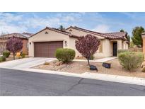 Charming single-story home with a well-manicured front yard and two car garage at 5928 Radiance Park St, North Las Vegas, NV 89081